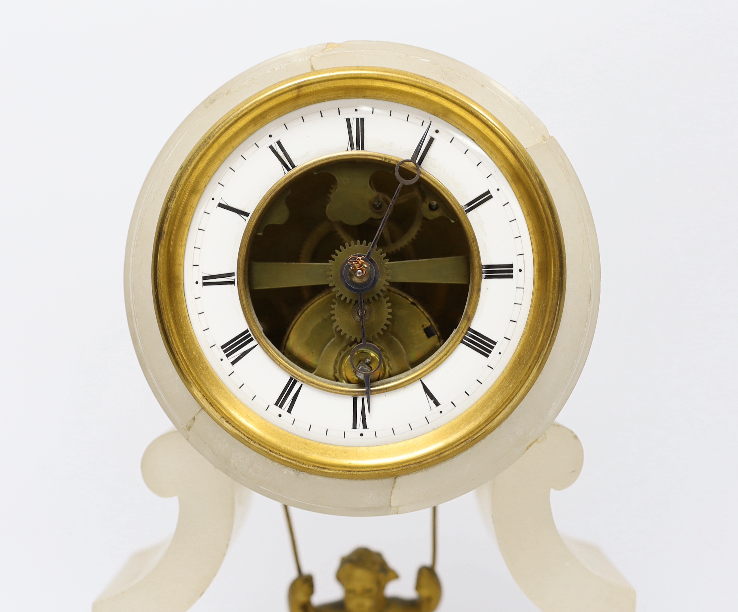 A late 19th century French alabaster and gilt metal mantel clock, with ebonised stand and glass dome, total height 32.5 cm